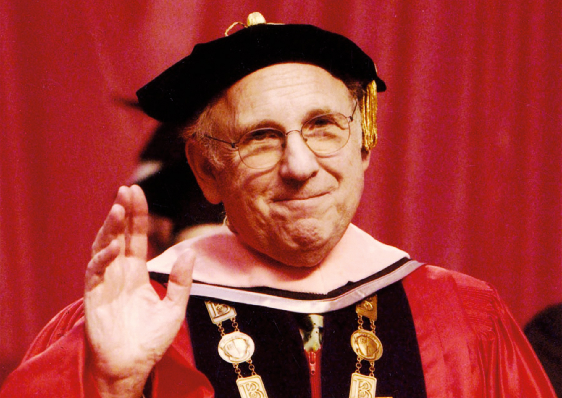 Image of Lee Berk in a cap and gown