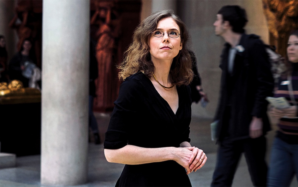 Photo of Madeline Miller, perusing antiquities at New York's Metropolitan Museum.