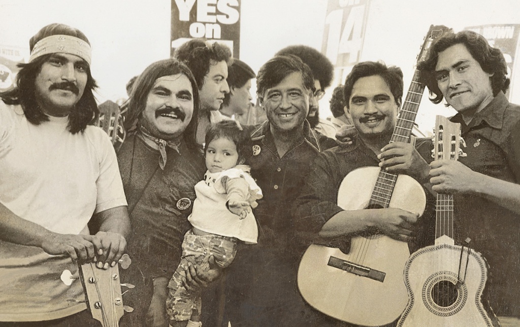 Image of Ramon "Chunky" Sanchez at a United Farm Workers rally with César Chávez.
