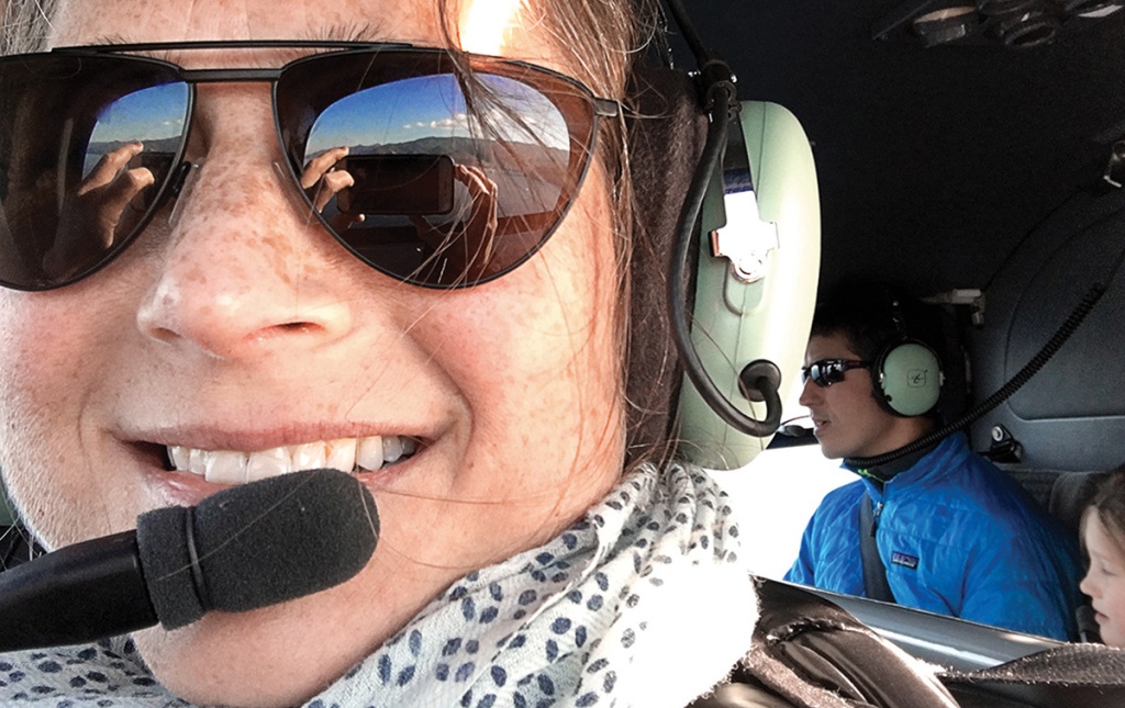 A selfie of Sylvia Winter flying a plane