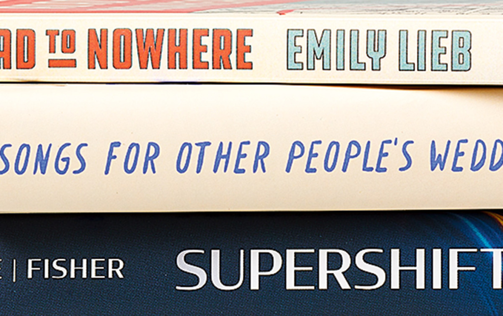 Book spines by Ja-Naé Duane, Steve Fisher, David Levithan, and Emily Lieb