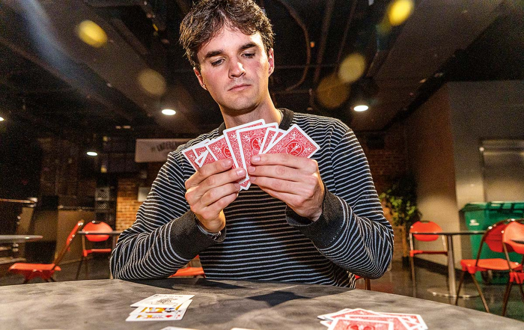 A person playing cards