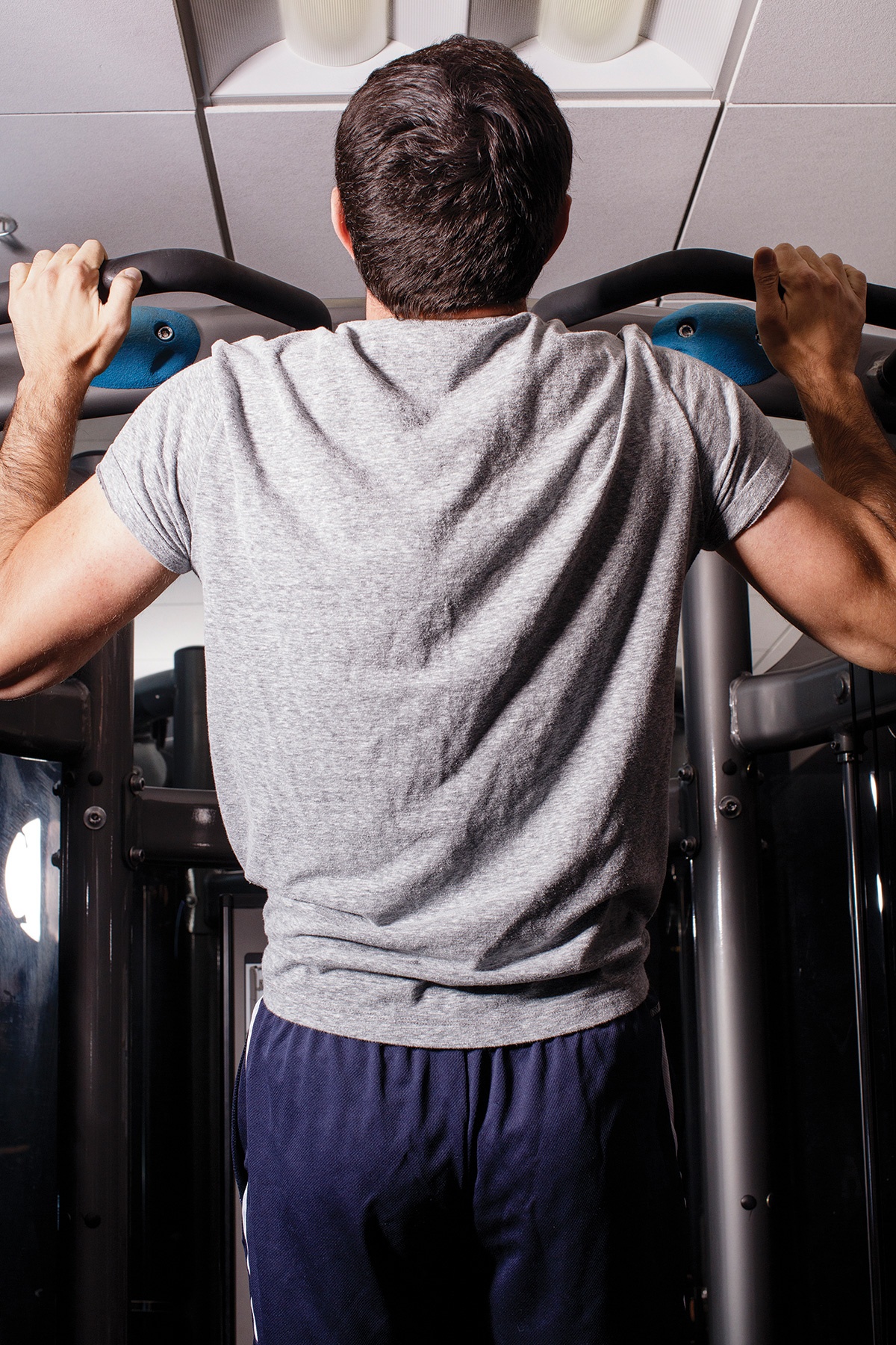 A photograph of Max Deutsch completing a pull-up.