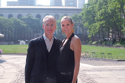 Photo of Tim Gunn and Heidi Klum looking at the camera.