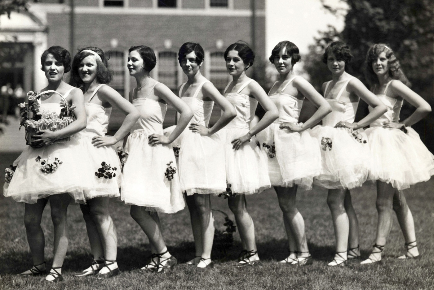 Dancers lead the procession at Ivy Day.