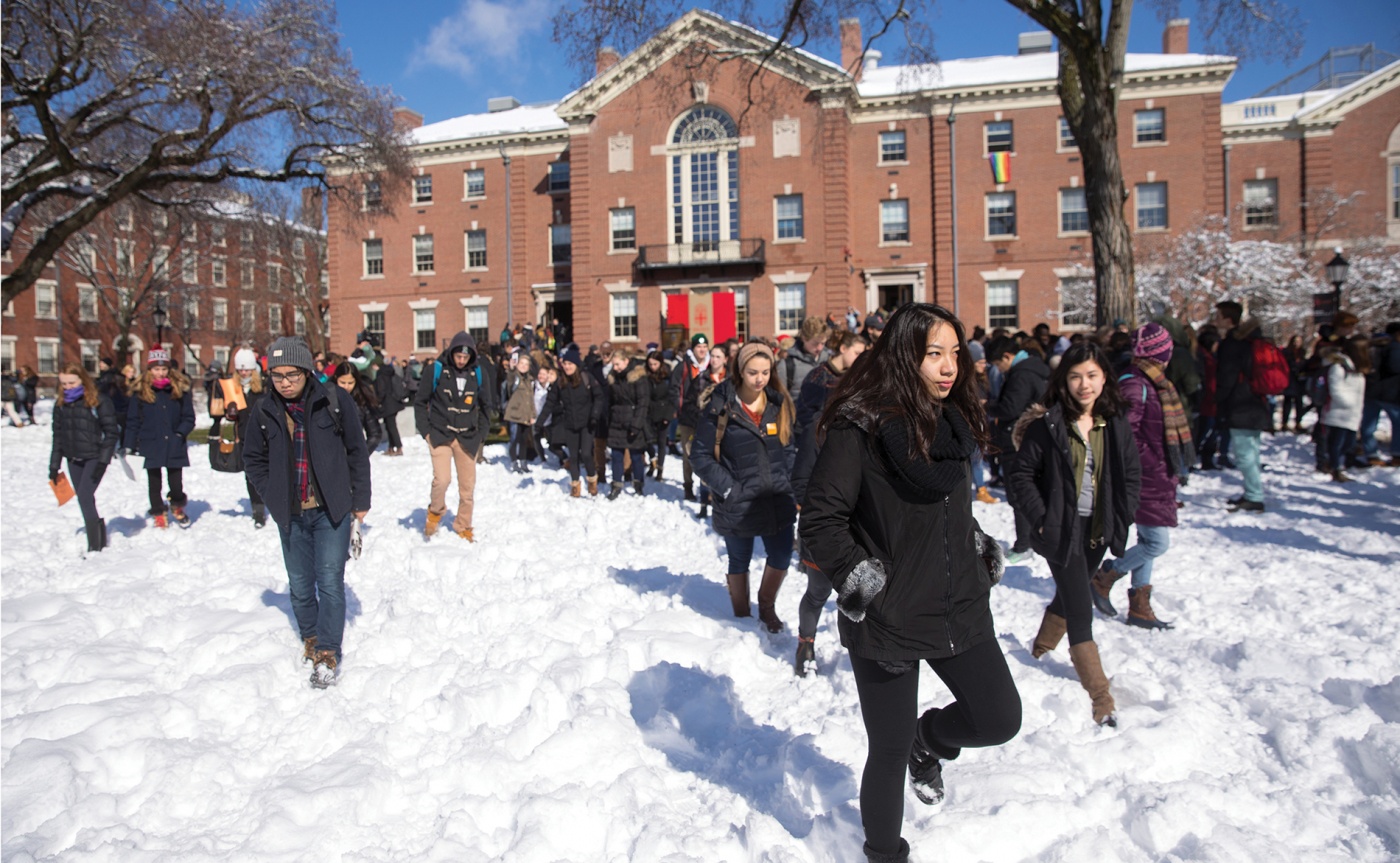 Students on the main green in the snow.