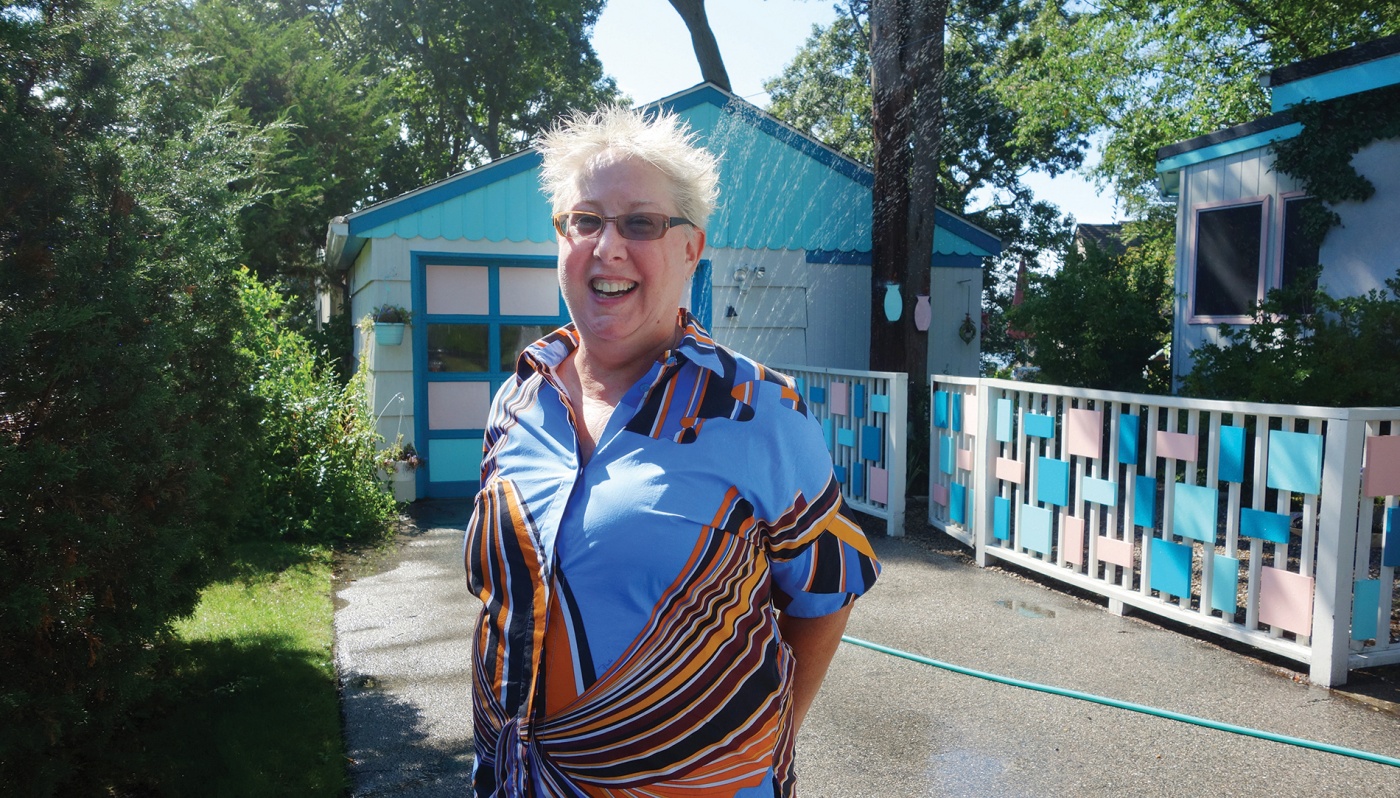 Photo of Professor Lynne Joyrich in front of her house