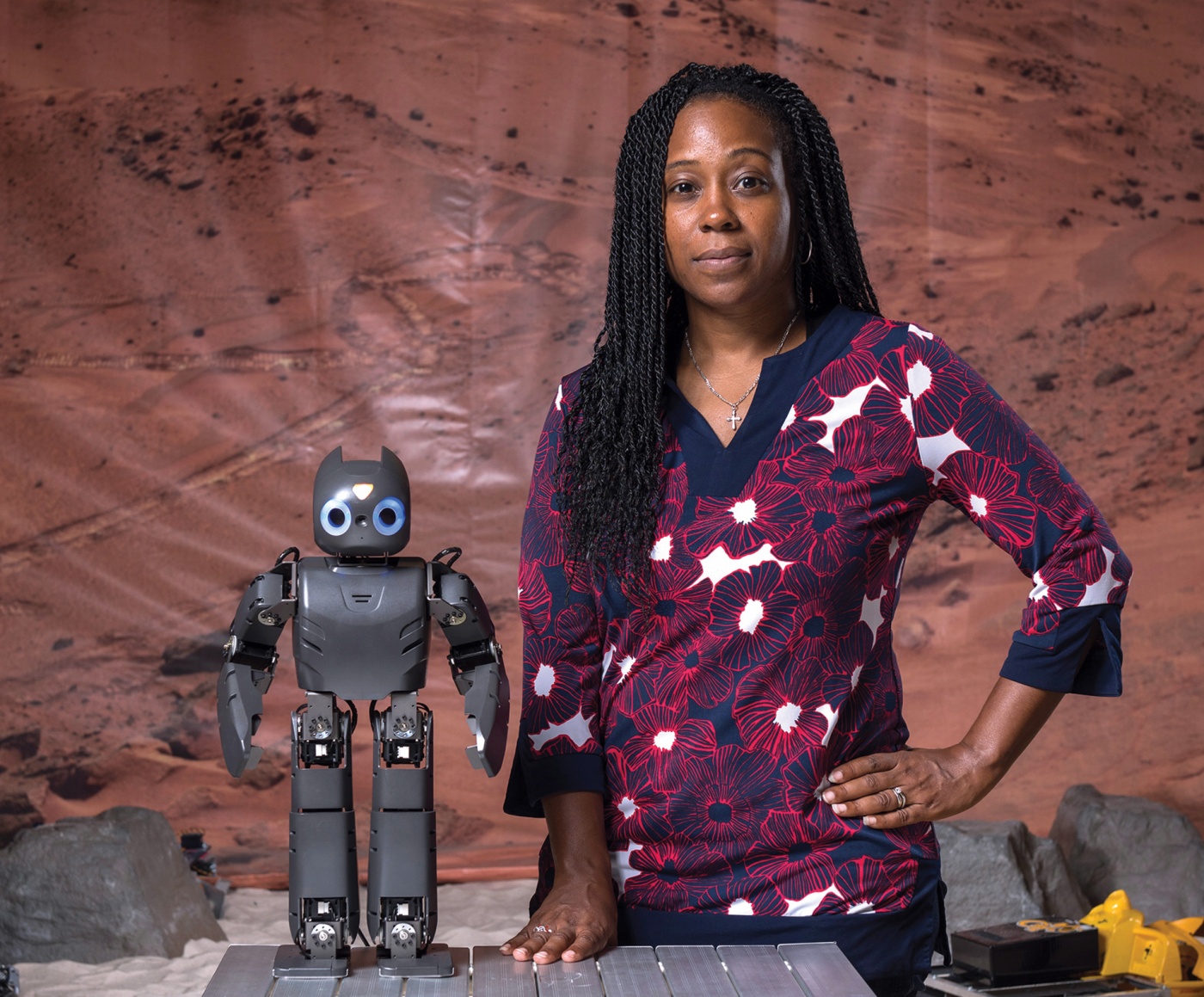 Photo of Ayanna Howard with a robot