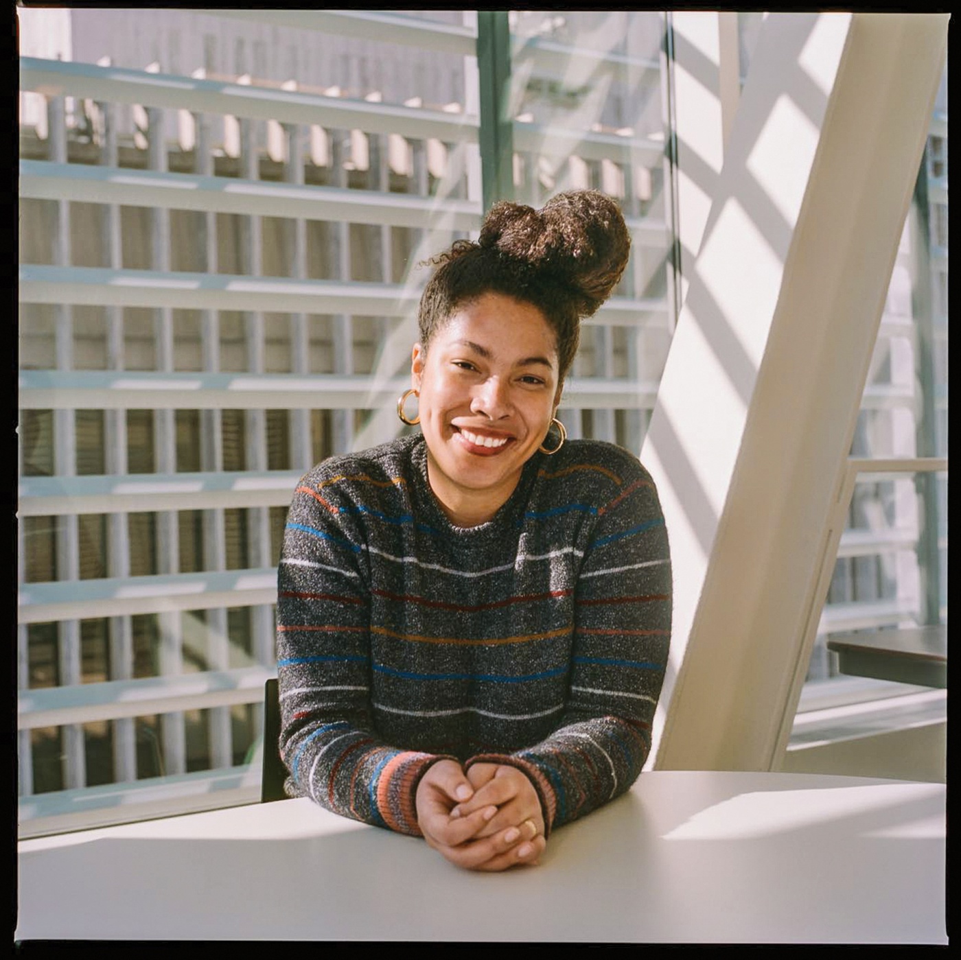 Photograph of Jackie Sibblies Drury ’10 at a desk