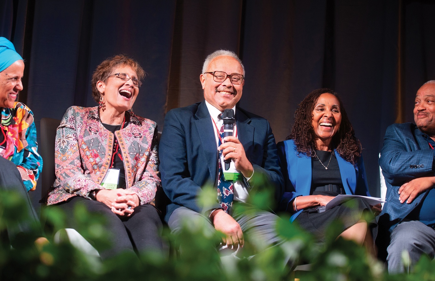 Photo of Ken McDaniel ’69 with others on stage at his 50th reunion