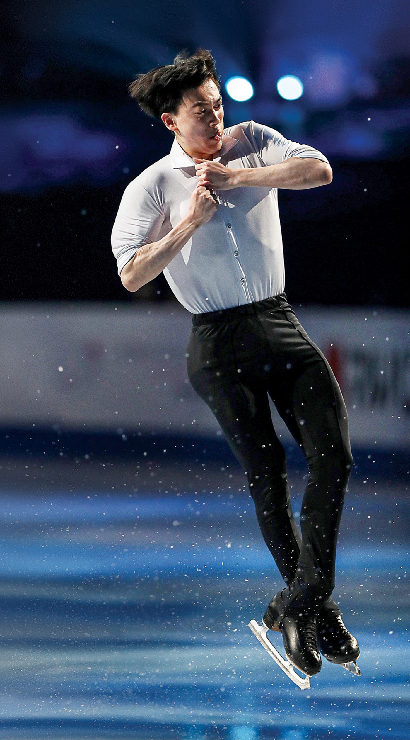 Zhou mid-rotation on the ice
