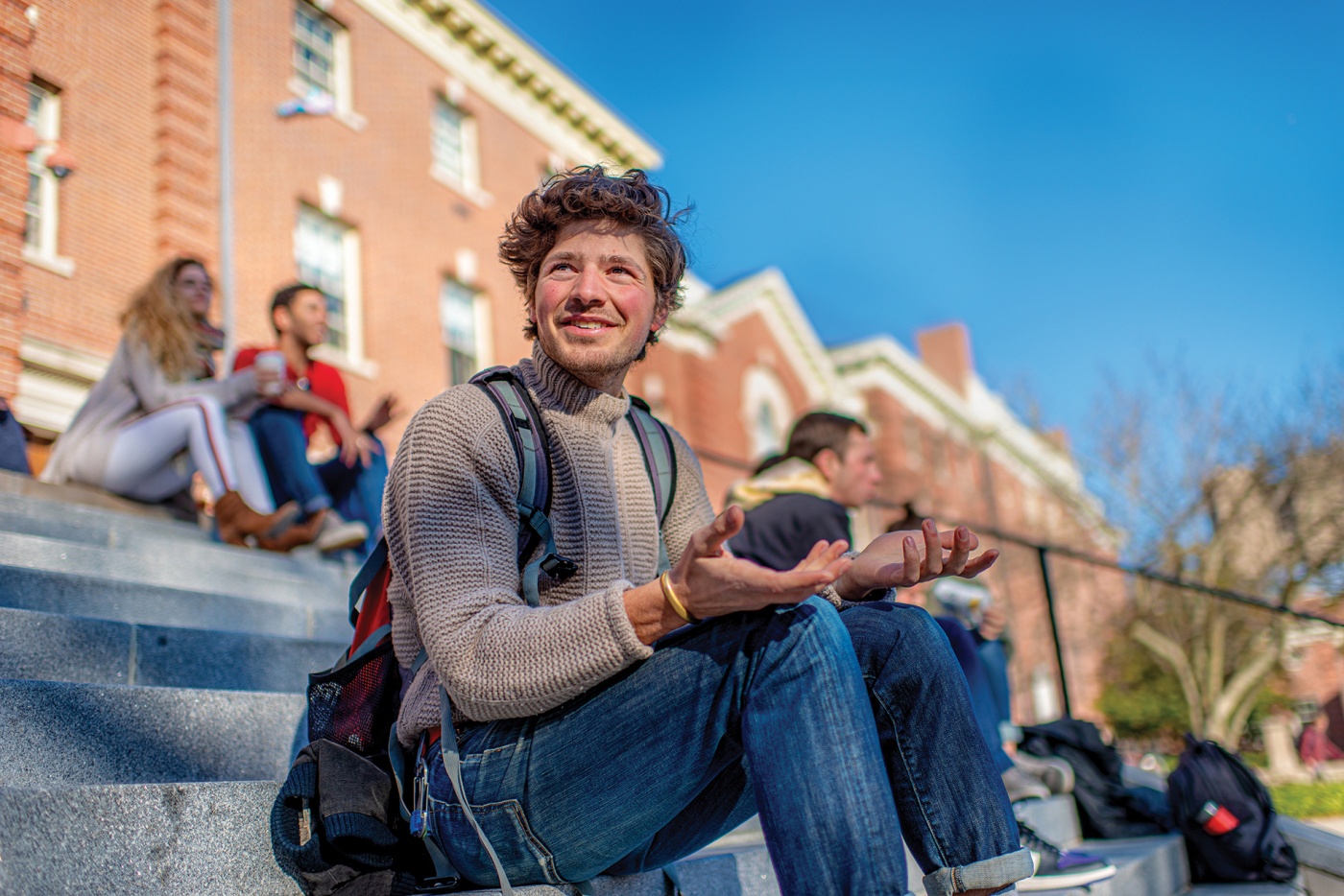 Photo of Oren Karp ’20 on steps of Robert Center