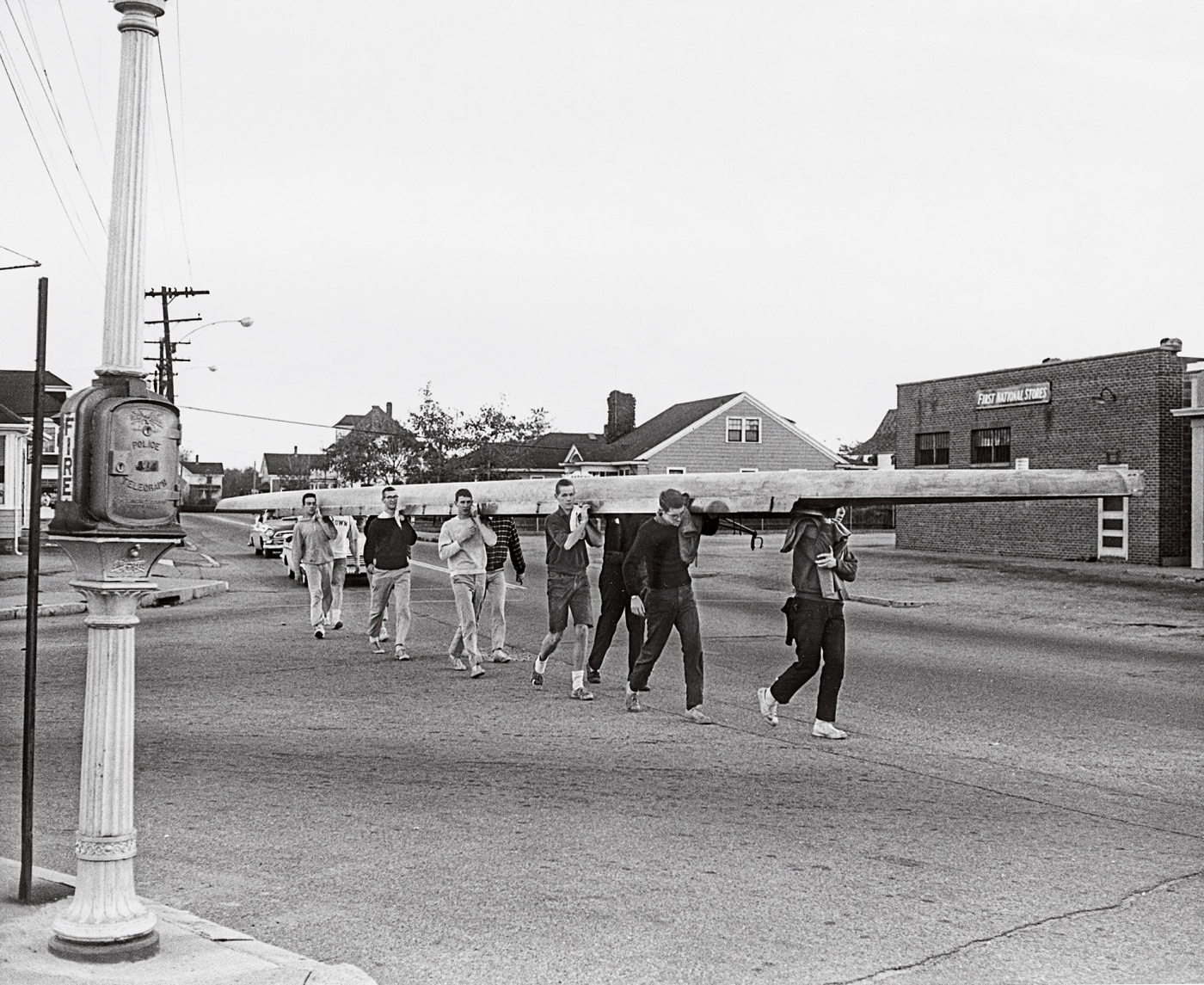 1960 crew carrying shell on street