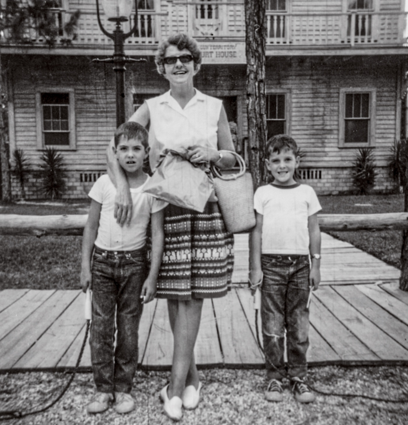 Ball (right) and brother Theodore with their mother Janet in 1966.