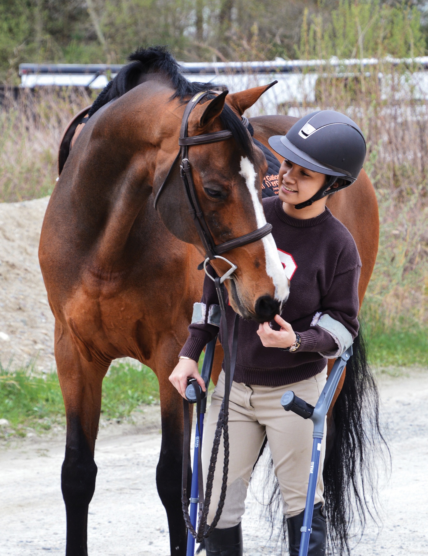 Equestrienne Lauren Reischer ’21 with her horse