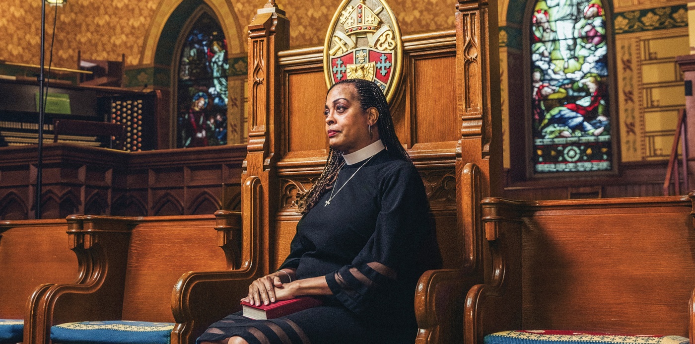 Image of Paula Clark sitting with Bible