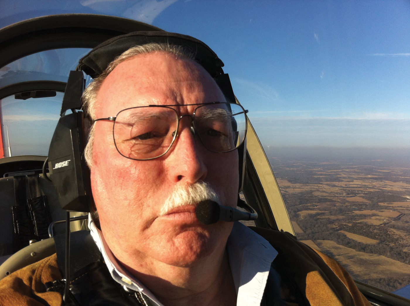 George Braly flying a plane