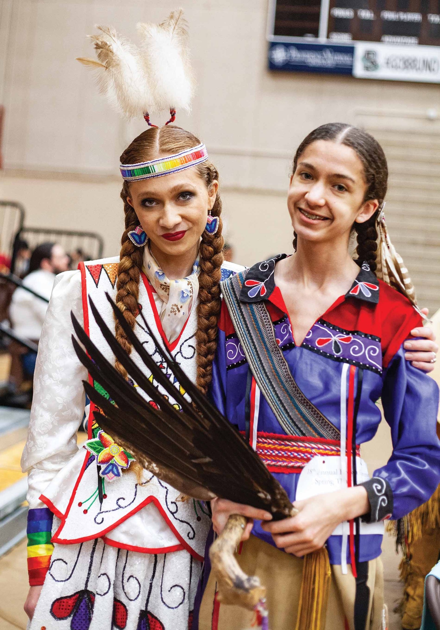 Image of Sherente Harris and Nkéke Waupianoohom Harris at a powwow at Brown University