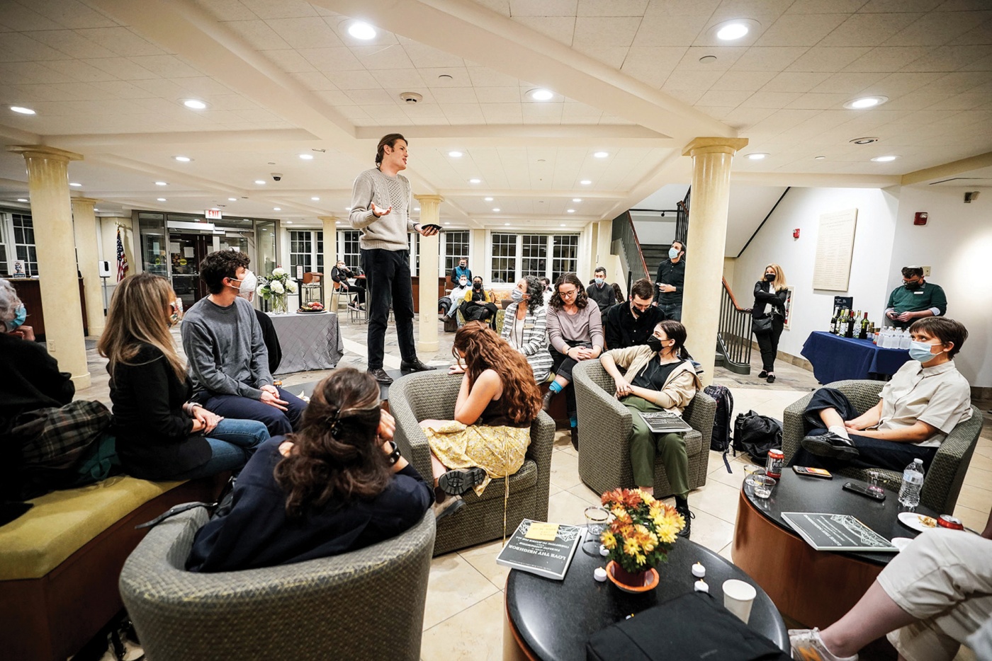 Image of Isaac Goldman Sonnefelt talking to a crowd at Brown University. 