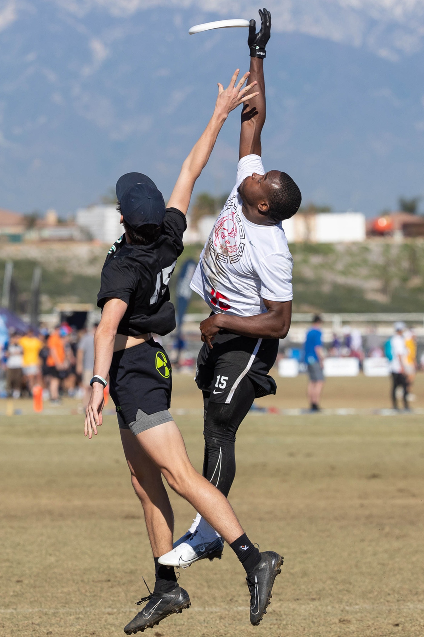 Image of Azeez Adeyemi catching the frisbee in Brown match