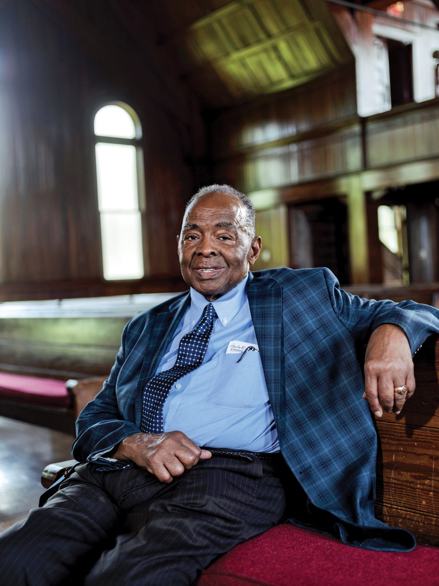 photo of Dr. Robert Smith in the chapel at Tougaloo College