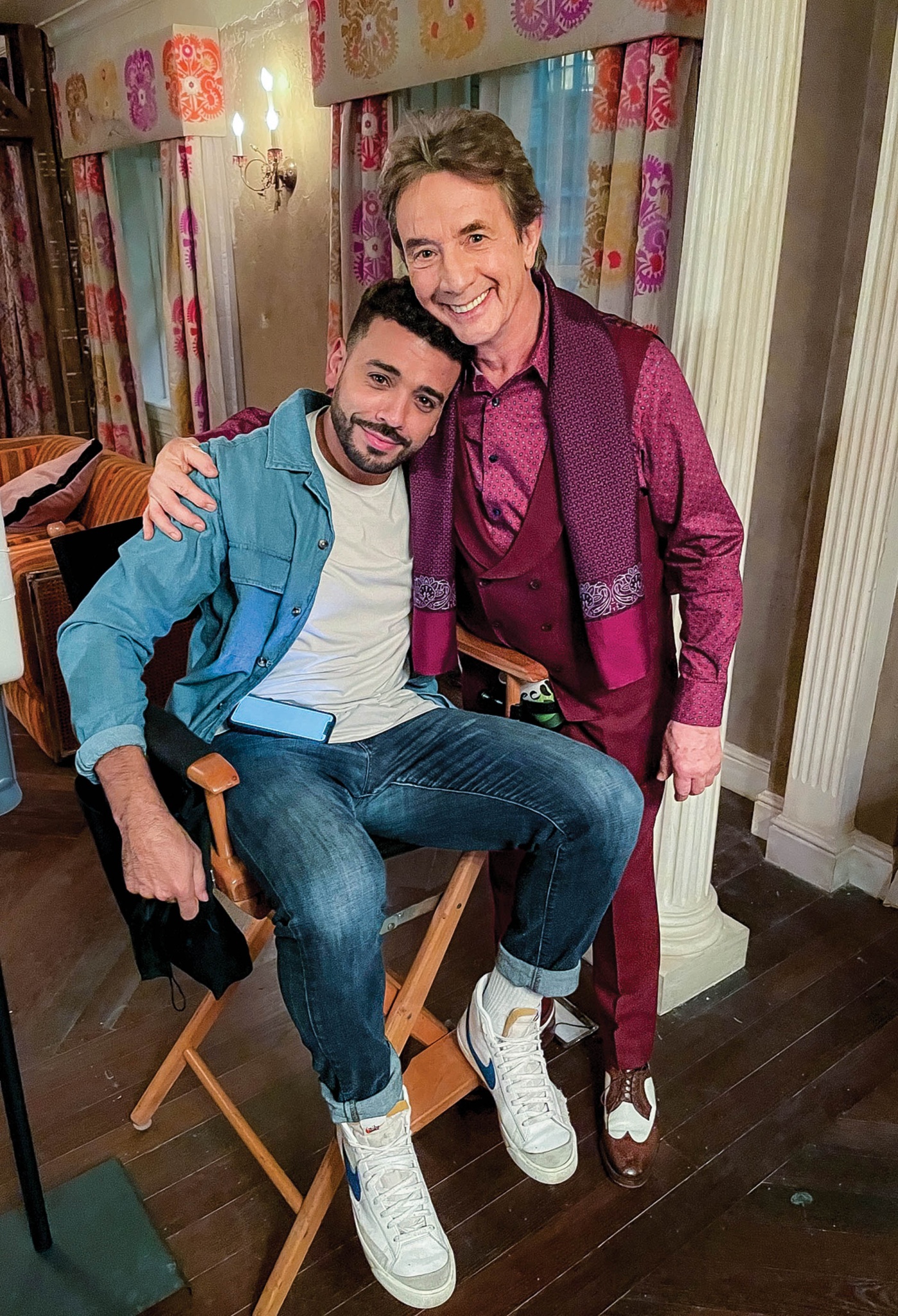 Image of Ryan Broussard on set with Martin Short on set for season two of "Only Murders"