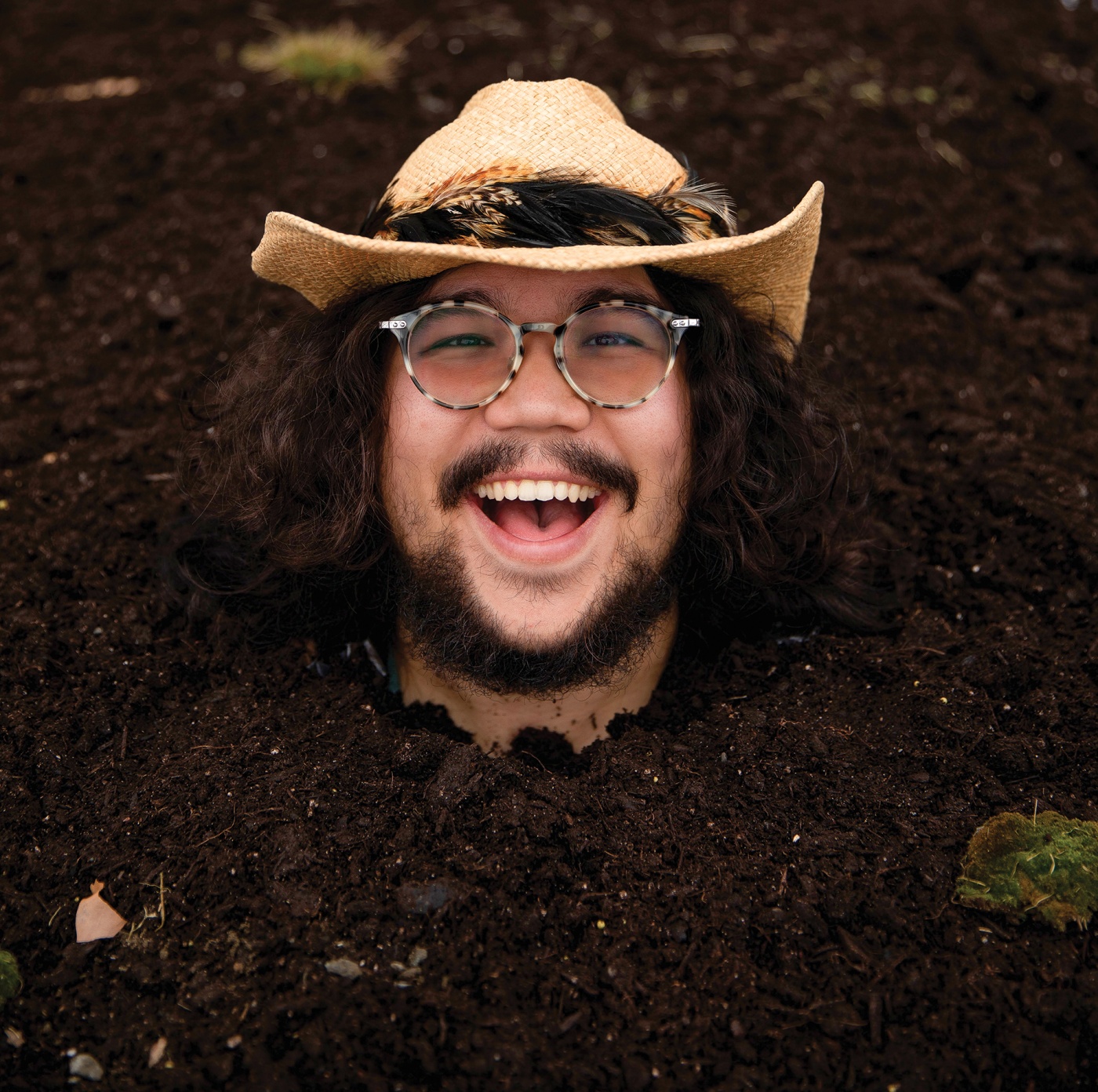 photo of Chance Emerson, buried up to his neck in soil