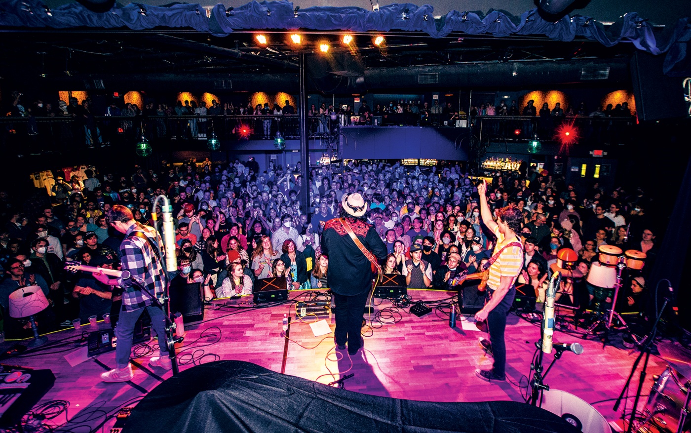 photo of Chance and his bandmates on stage