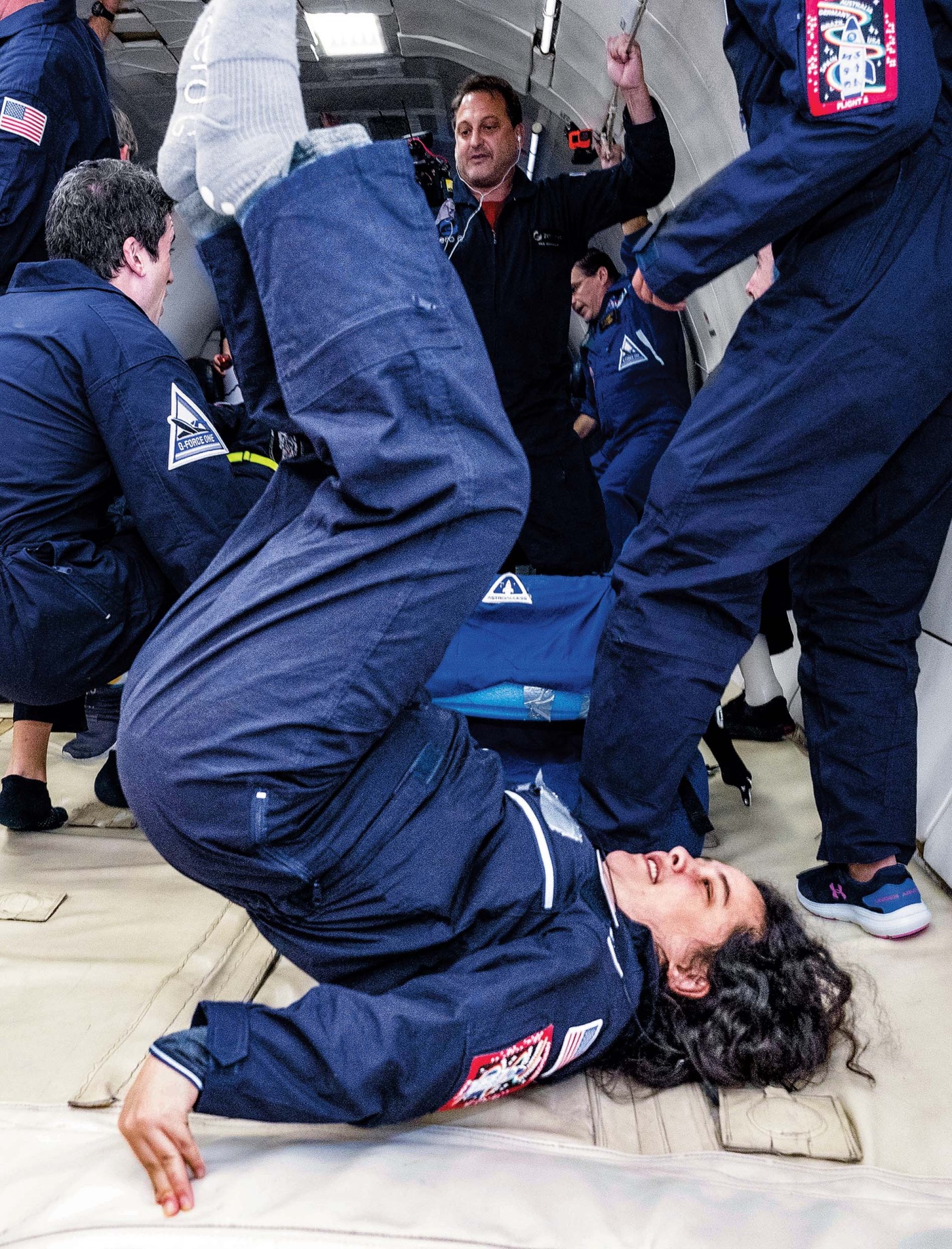 Image of Lindsay Yazzolino upside down in a zero gravity test.