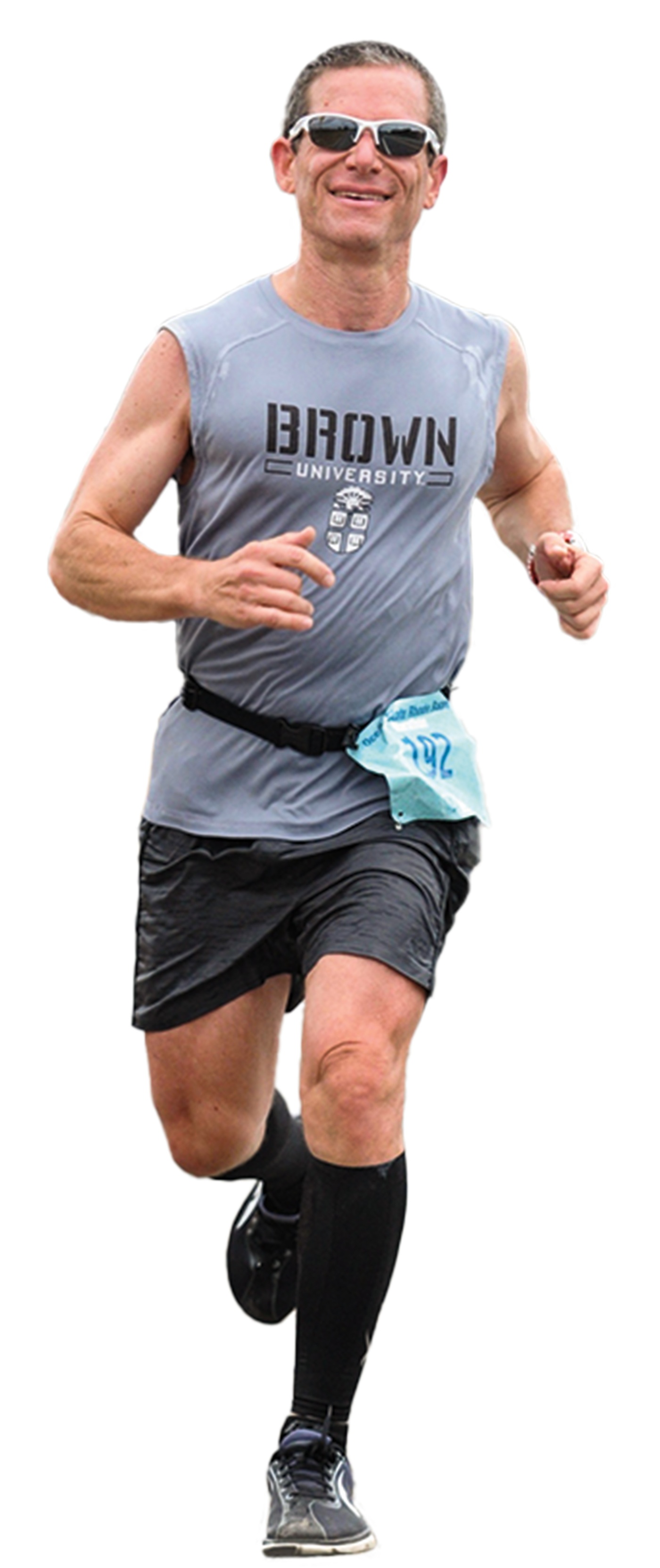 Image of Eliot Ephraim wearing a Brown t-shirt running in a race.