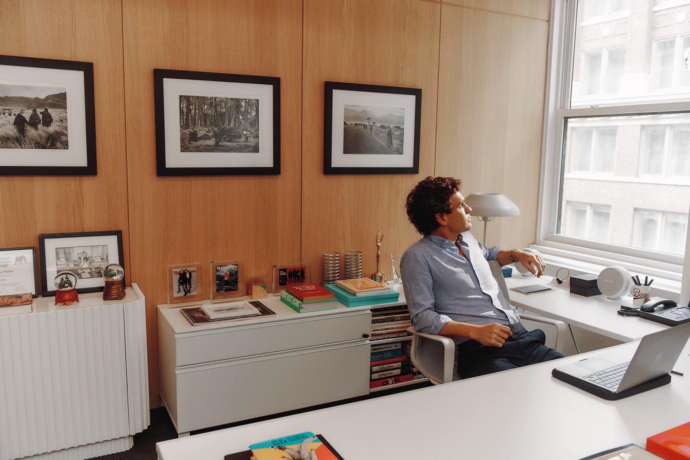 Gus Wenner photographed at his desk at Rolling Stone