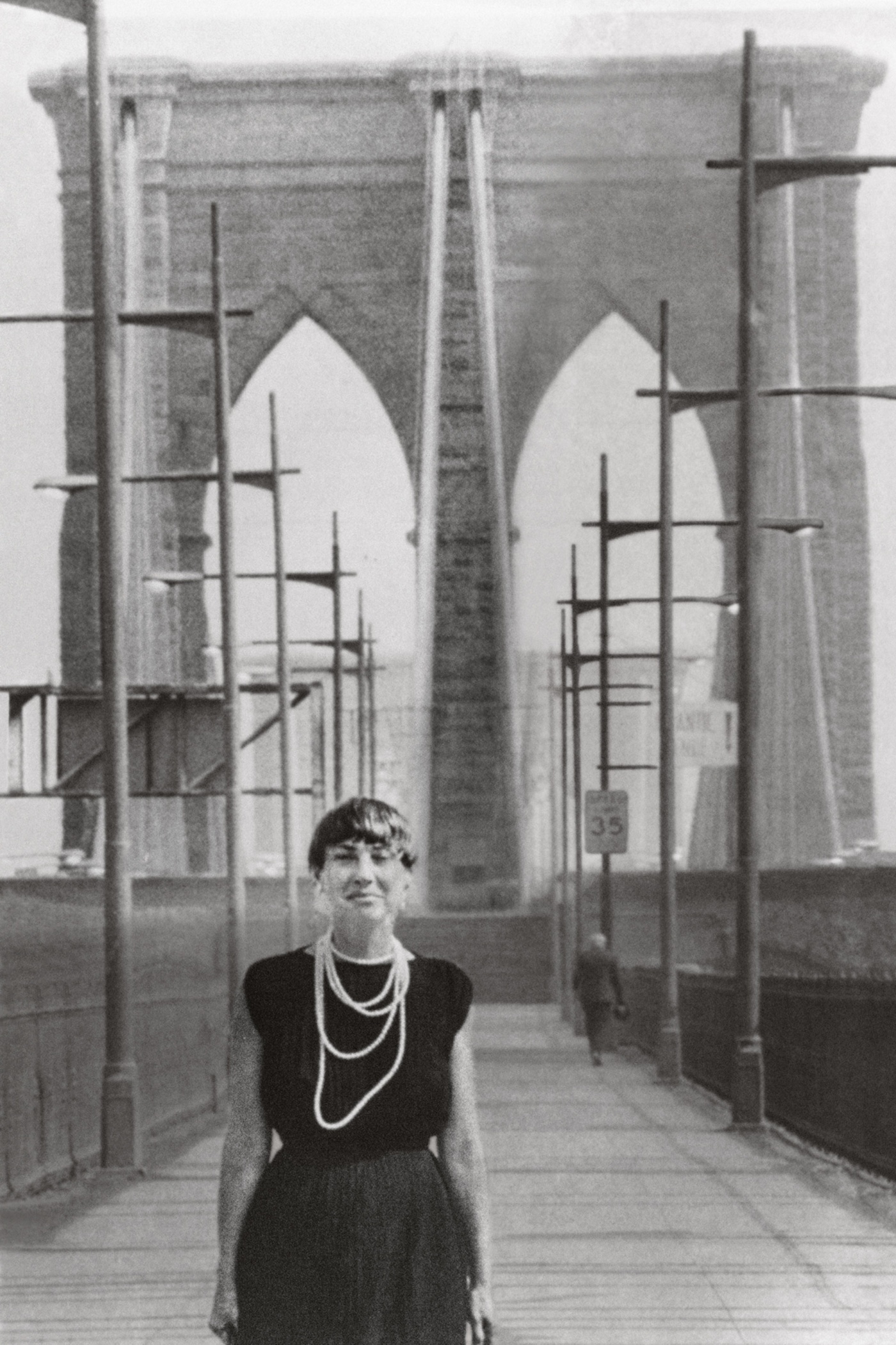 Image of Beverly Moss Spatt on the Brooklyn Bridge in the 1940’s