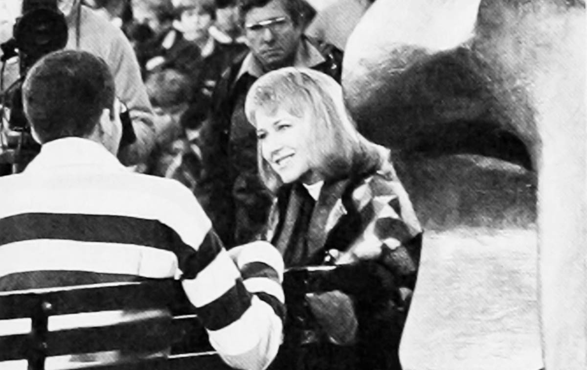 Archival image of Jane Pauley on set on campus in 1985