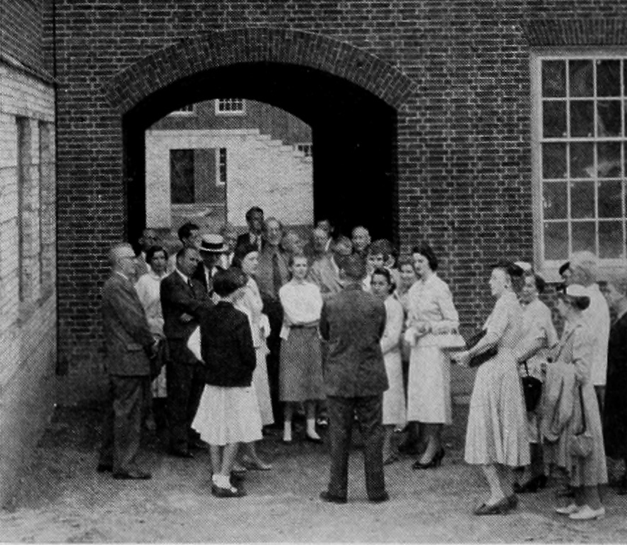 Archival image of individuals outside Keeney Quad