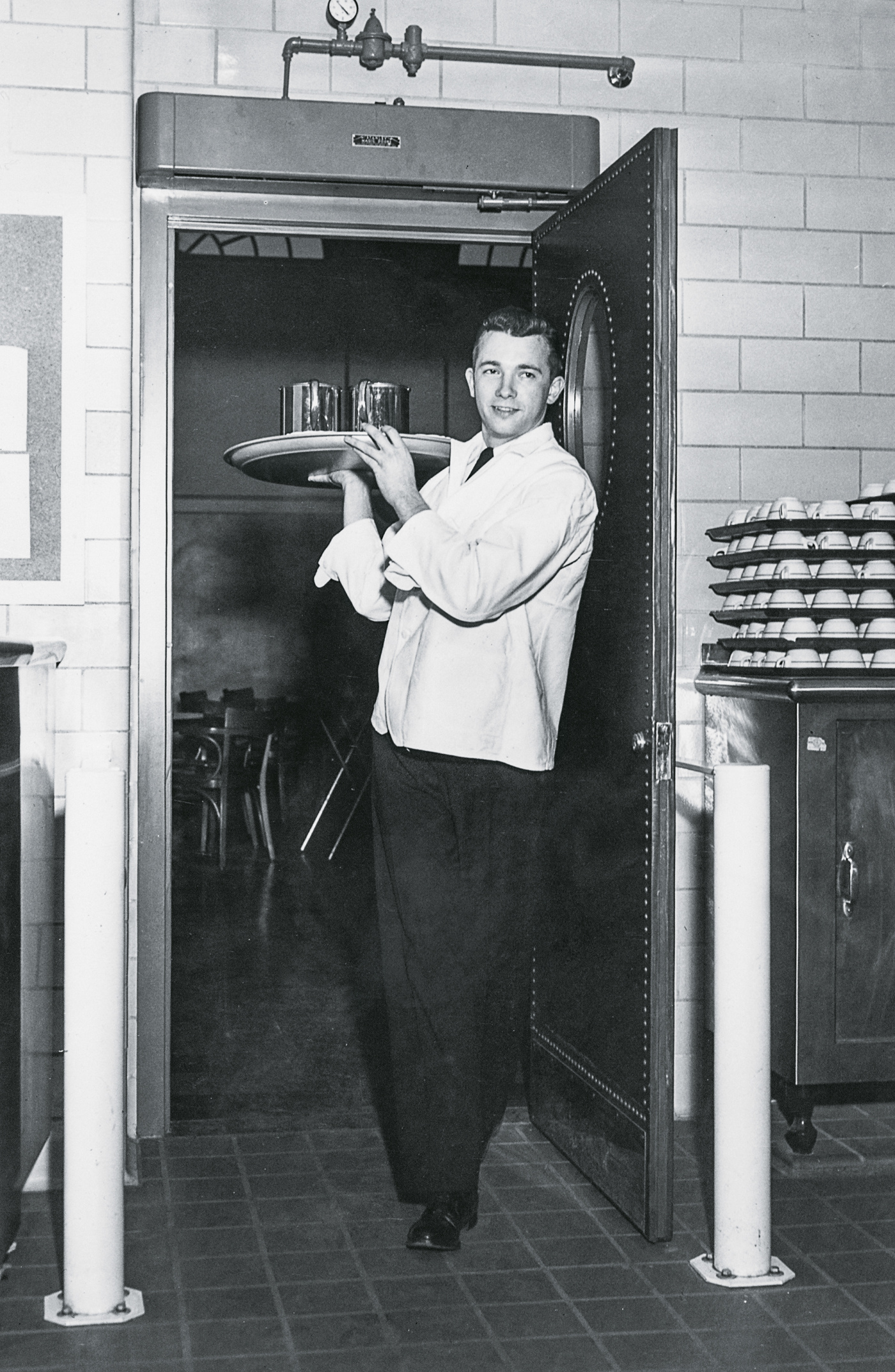 waiter with a full tray at the Ratty 1950s