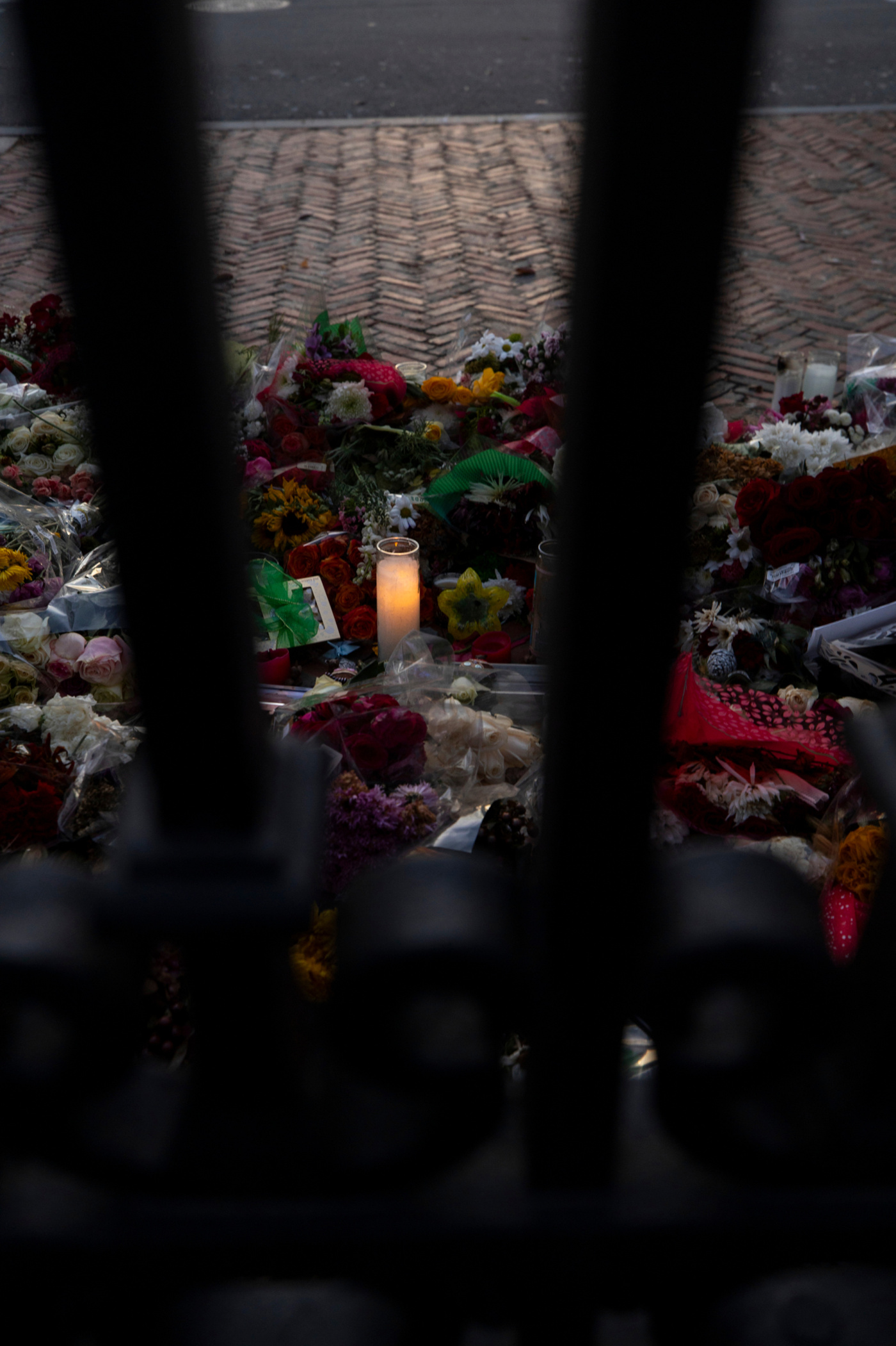 photo of an impromptu memorial at the Van Wickle Gates
