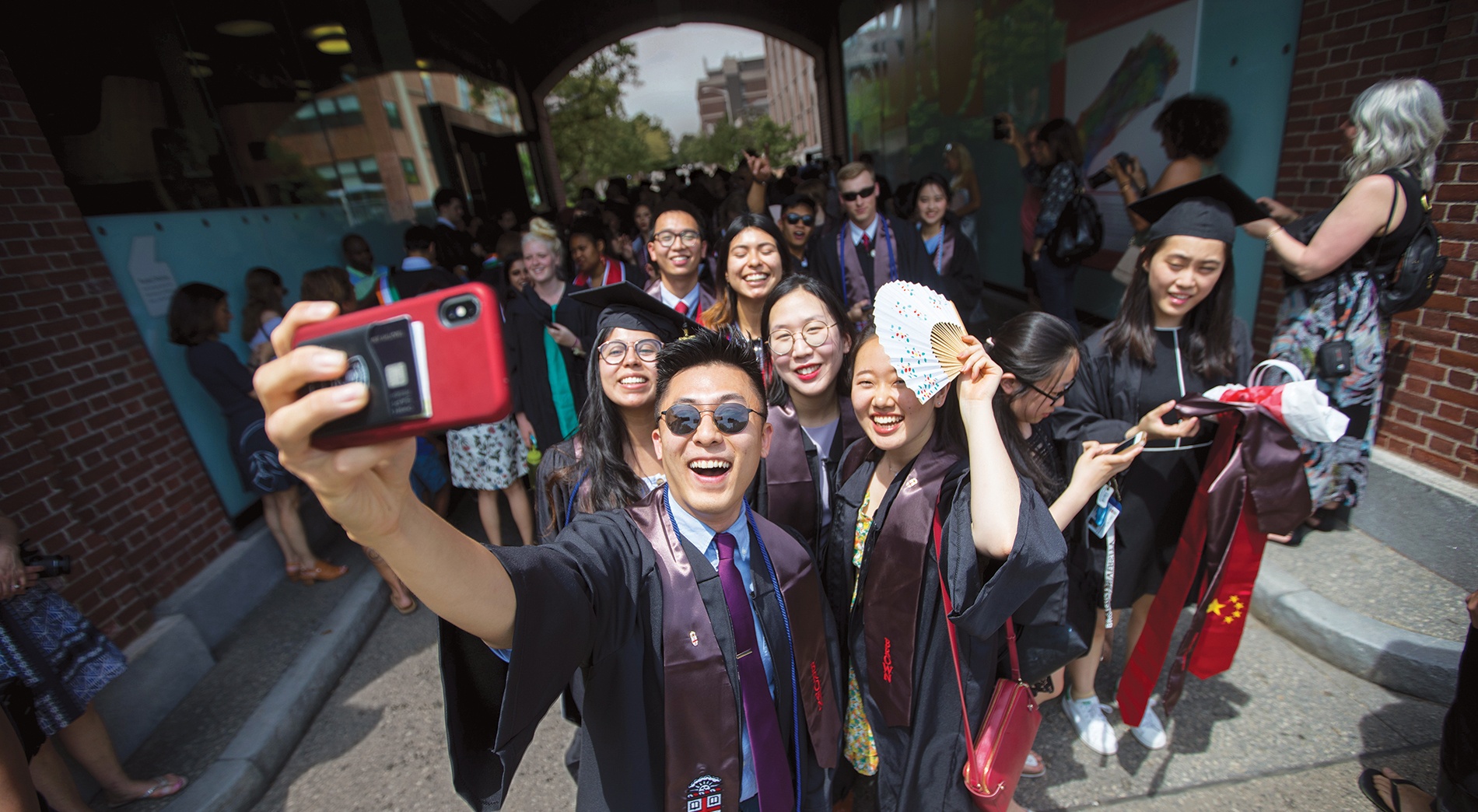 Graduating seniors taking a selfie. 