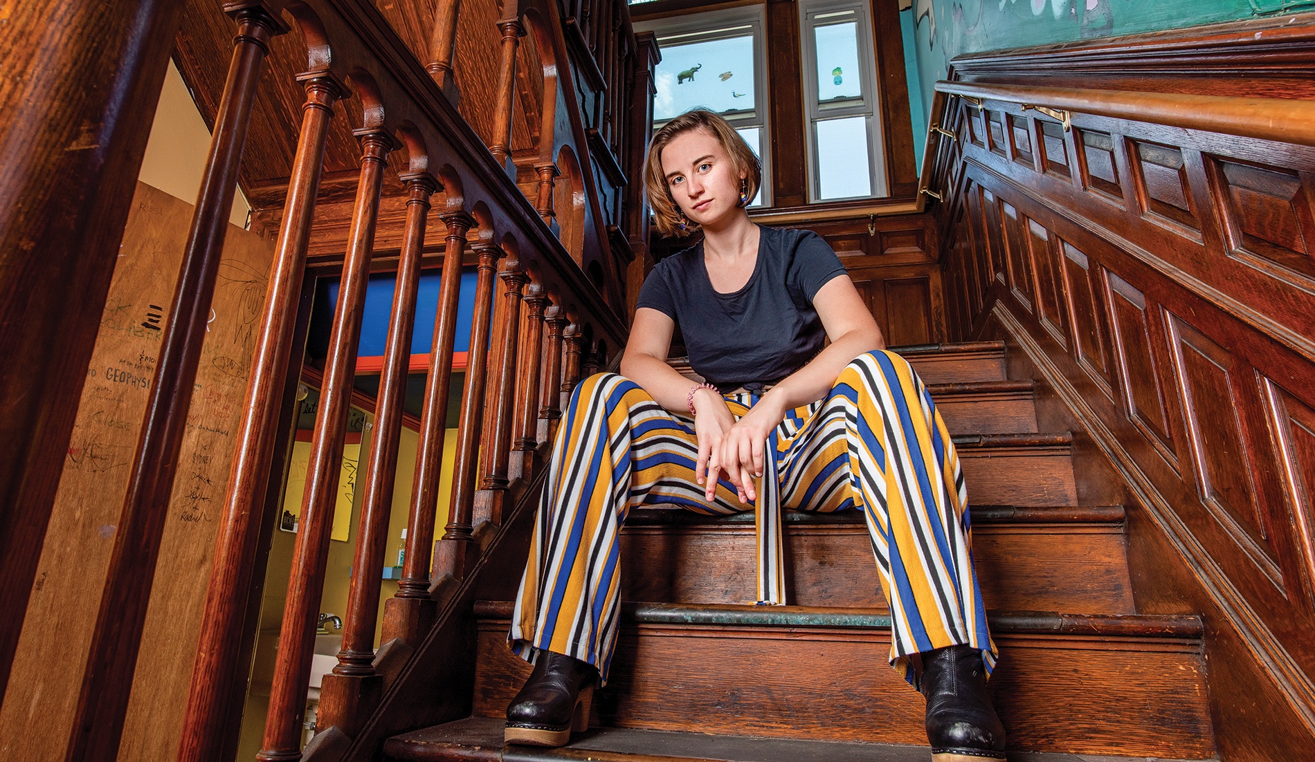 Roxanne Barnes ’21 sitting on the stairs in the Finlandia co-op