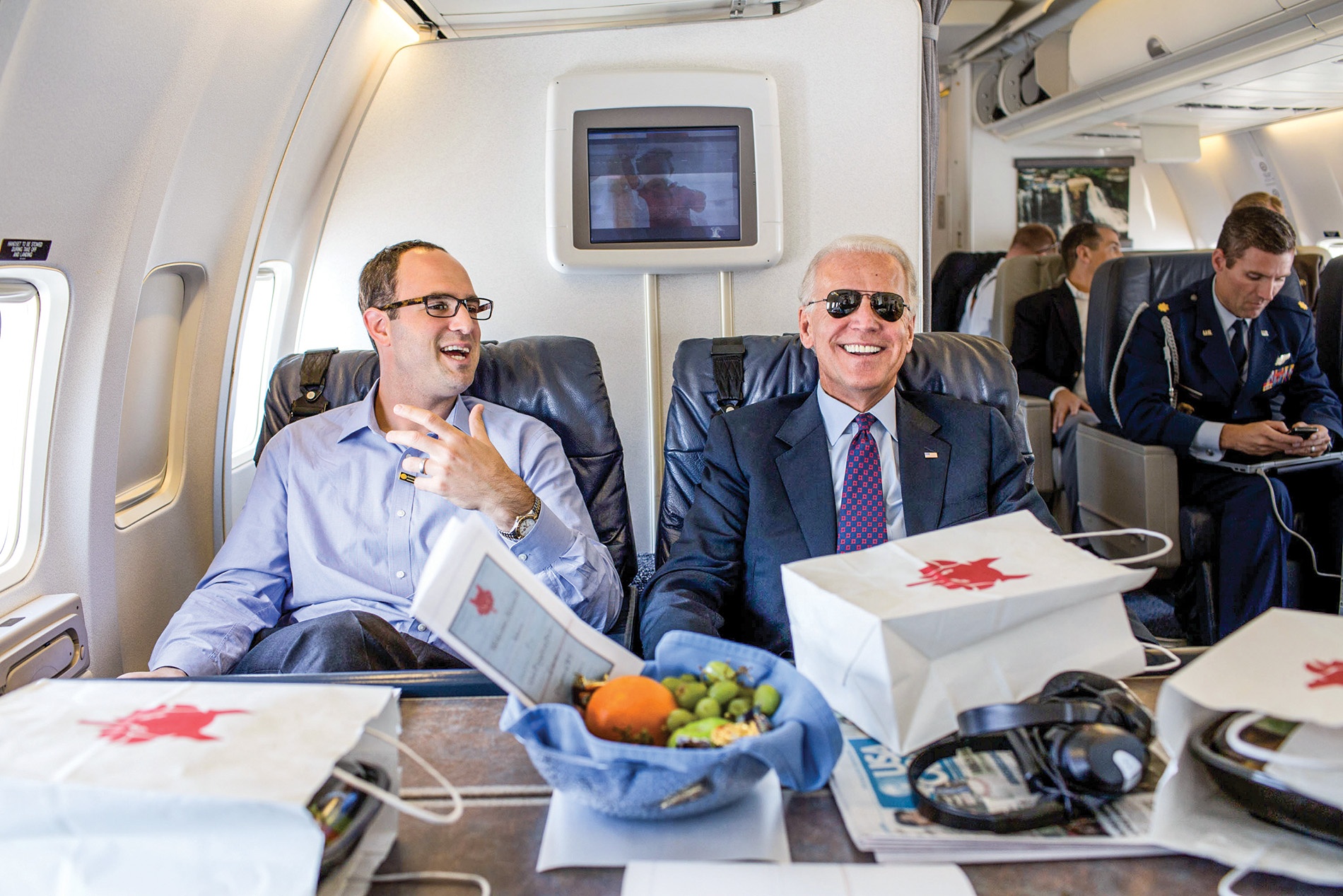 Image of Jeffrey Nussbaum with then Vice-President Biden on a plane/Official White House Photo