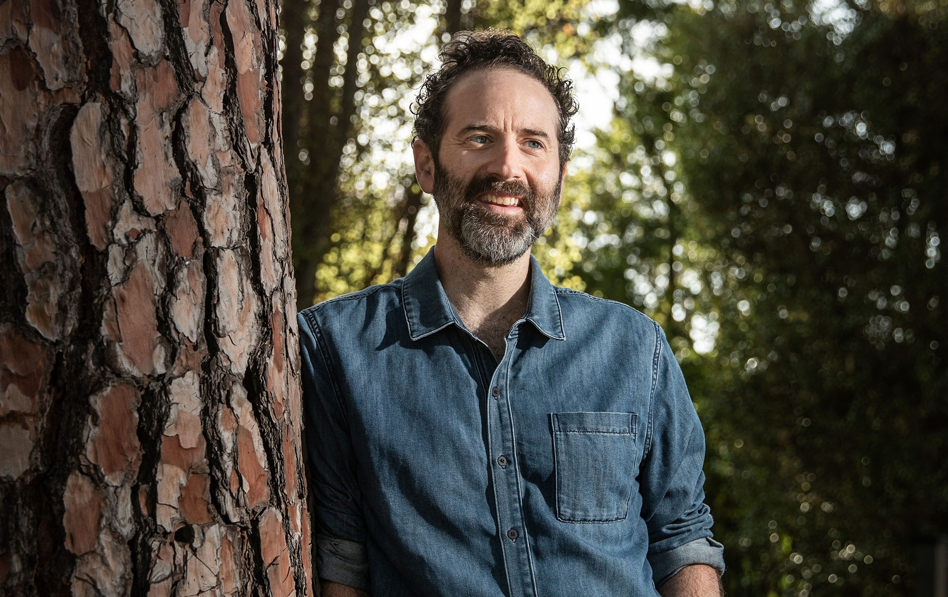 Image of Dan O'Brien leaning against a tree