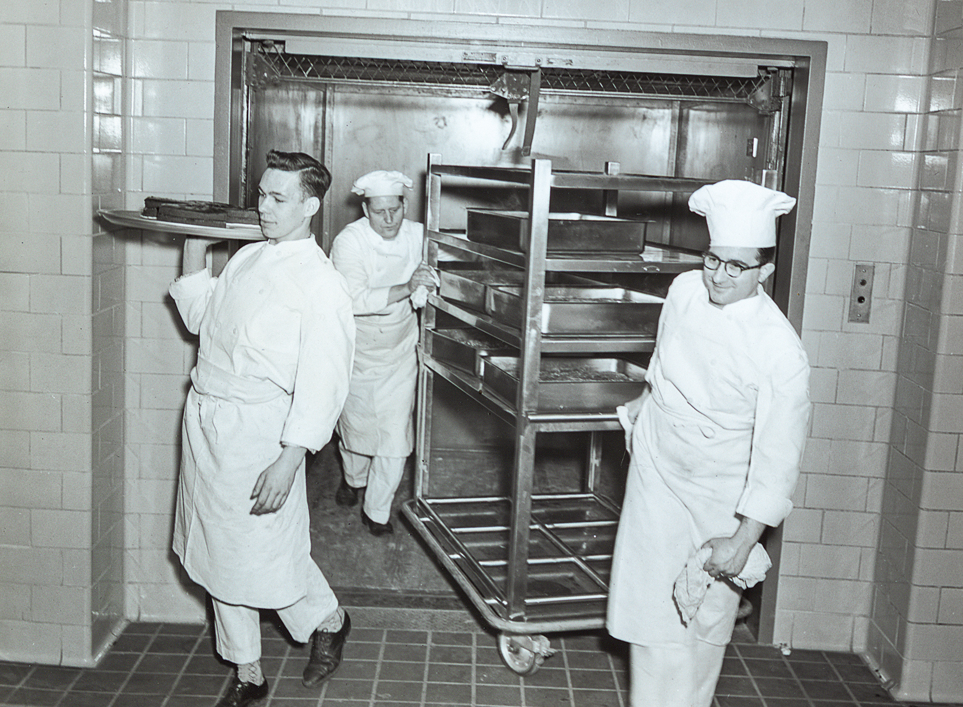 Ratty servers in the kitchen, 1950s