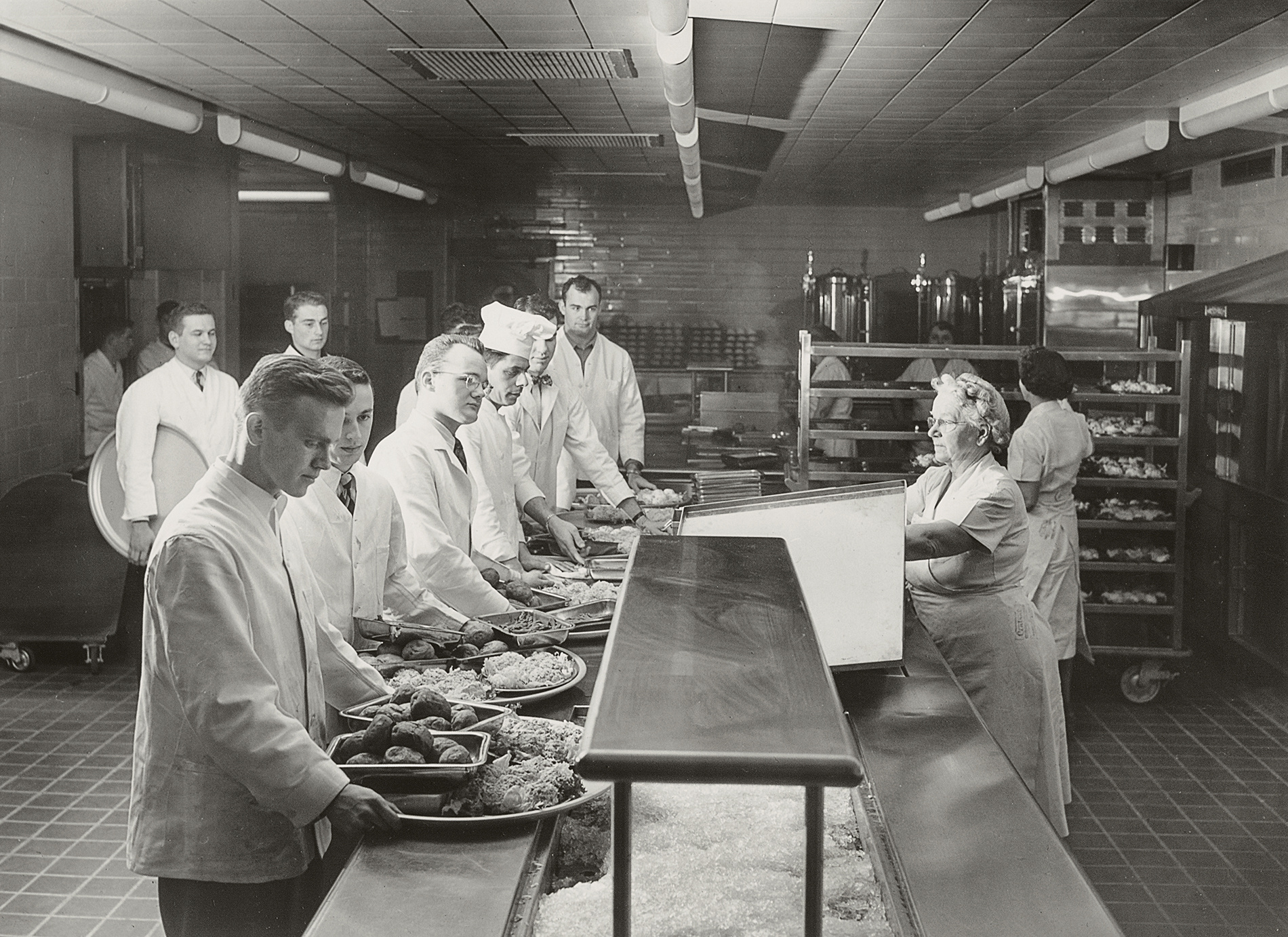 waiters wait for food in the Ratty kitchen