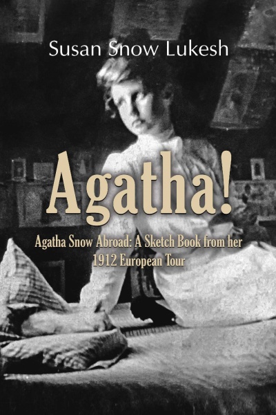 Image of Agatha Snow sitting on a bed...