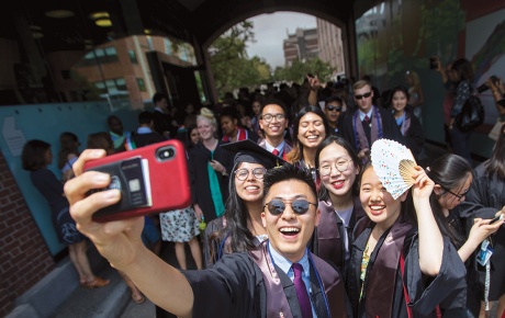 Graduating seniors taking a selfie. 