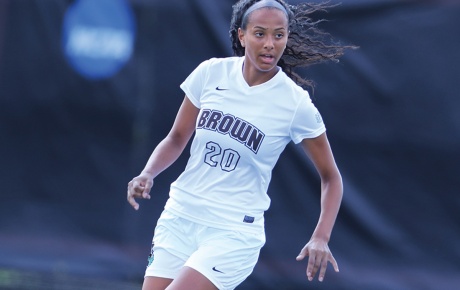 Photo of Sydney Cummings ’21 playing soccer in her Brown team uniform (number 20)