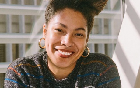 Photograph of Jackie Sibblies Drury ’10 at a desk