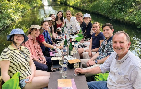 Image of students and professor in a gondola on a river in Germany 