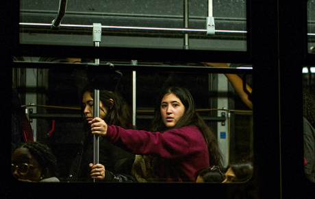 photo of students being evacuated via bus